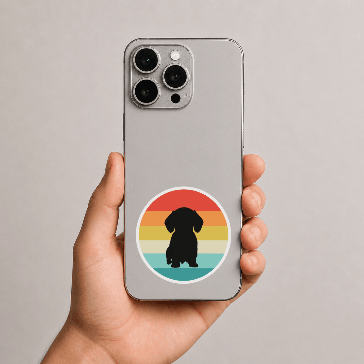 iPhone with Woofyful sunset sticker