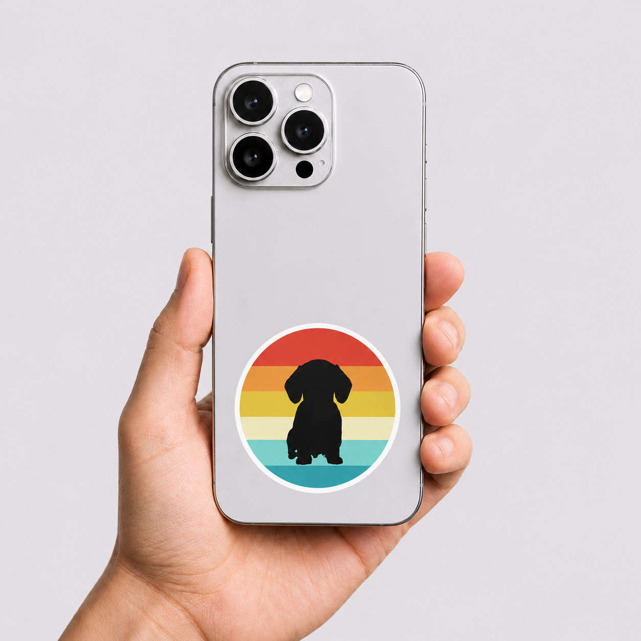 iPhone with Woofyful sunset sticker